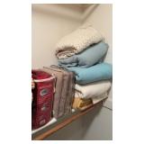 7 blanket collection in the walk-in closet,