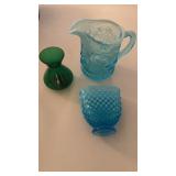 Light blue and opalescent creamer and the cherry