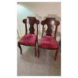 Two matching antique side chairs, with a