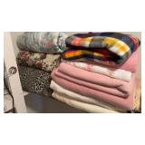 Collection of blankets and bed coverlets,
