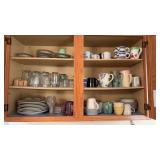 Kitchen cabinet lot that includes drinking