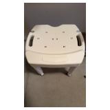 Adjustable height, hard plastic shower chair