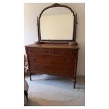 Antique 4 drawer dresser with large back mirror,