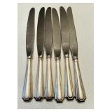 6 sterling silver handled dinner, knives, and the
