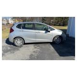2015 Silver Honda Fit car , in running condition