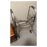 Standard aluminum walker with wheels in the front