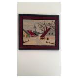 Small framed needlepoint of snowy village scene