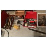 Tool collection, on the bottom shelf, includes a