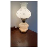 Vintage table, light milk class base, and