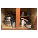 Kitchen cabinet of cook pots pans rolling pin