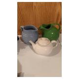 Hall pottery green water pitcher, with the ice