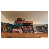 15 boxes puzzles, mostly 300 piece puzzles with
