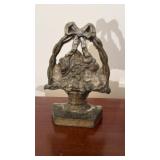 Antique cast-iron doorstop, basket of flowers,