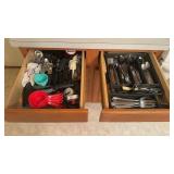 Two kitchen drawers of stainless steel, flatware,