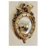 Vintage gold plastic small bullï¿½s-eye mirror