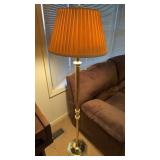 Tall, brass double light floor lamp, with pleaded
