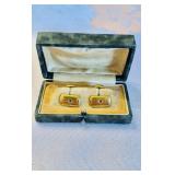 Pair of gold plate cufflinks with center diamond