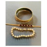 3 costume bracelets, gold, bangle bracelet, red,