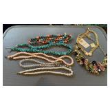 7 better costume, necklaces, includes a pink