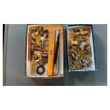 Collection of cufflinks and lapel pins, military