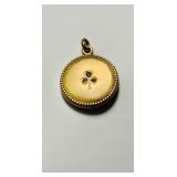 Victorian Gold, tone locket with a large monogram