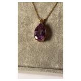 14 K gold large amethyst stone pendant with a 14