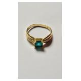 18 K gold & green emerald stone, with six small