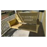 Antique wood porch, swing, most likely oak, with