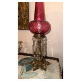 Pair of table lamps with cranberry glass shades,