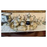 11 pieces of silver plate that includes an extra