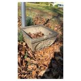 One single vintage concrete planter, with a shell