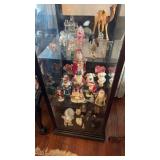 Contents of display cabinet, three shelves of