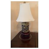 Blue and gold ceramic biscuit jar, lamp, on a