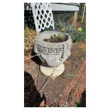 2 matching large concrete planters, with a Greek