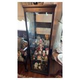 Antique showcase with three glass shelves on Kris