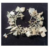 Antique sterling silver 40 charm bracelet, chain