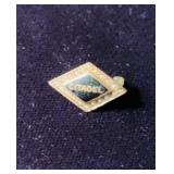 Small 10 K gold citadel brooch pin, black enamel
