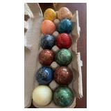 12 polished marble eggs, and a one dozen egg
