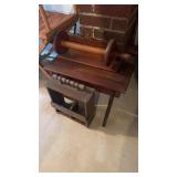 Three kitchen wooden items, paper towel holder, a