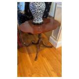 Small side table with three caster wheels , on