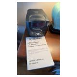 Small Brookstone CD clock radio alarm clock, with