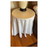 Pair of round portable, three leg tables, with a