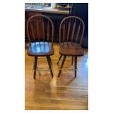 Pair of matching barstools, with a brass ring,