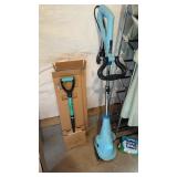 2 Sanjo garden tools one is a new spade shovel