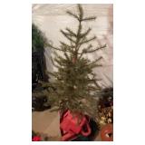 Charlie Brown Christmas tree with a tree skirt