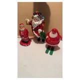 Three Santa Claus figures, one vintage white