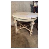 Small antique side table that has been painted