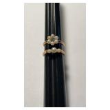 2 rings marked 14 K gold , both set with pearls,