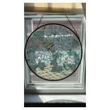 Round painted suncatcher of a basket with blue