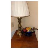 Brass table, lamp and blue glass console bowl